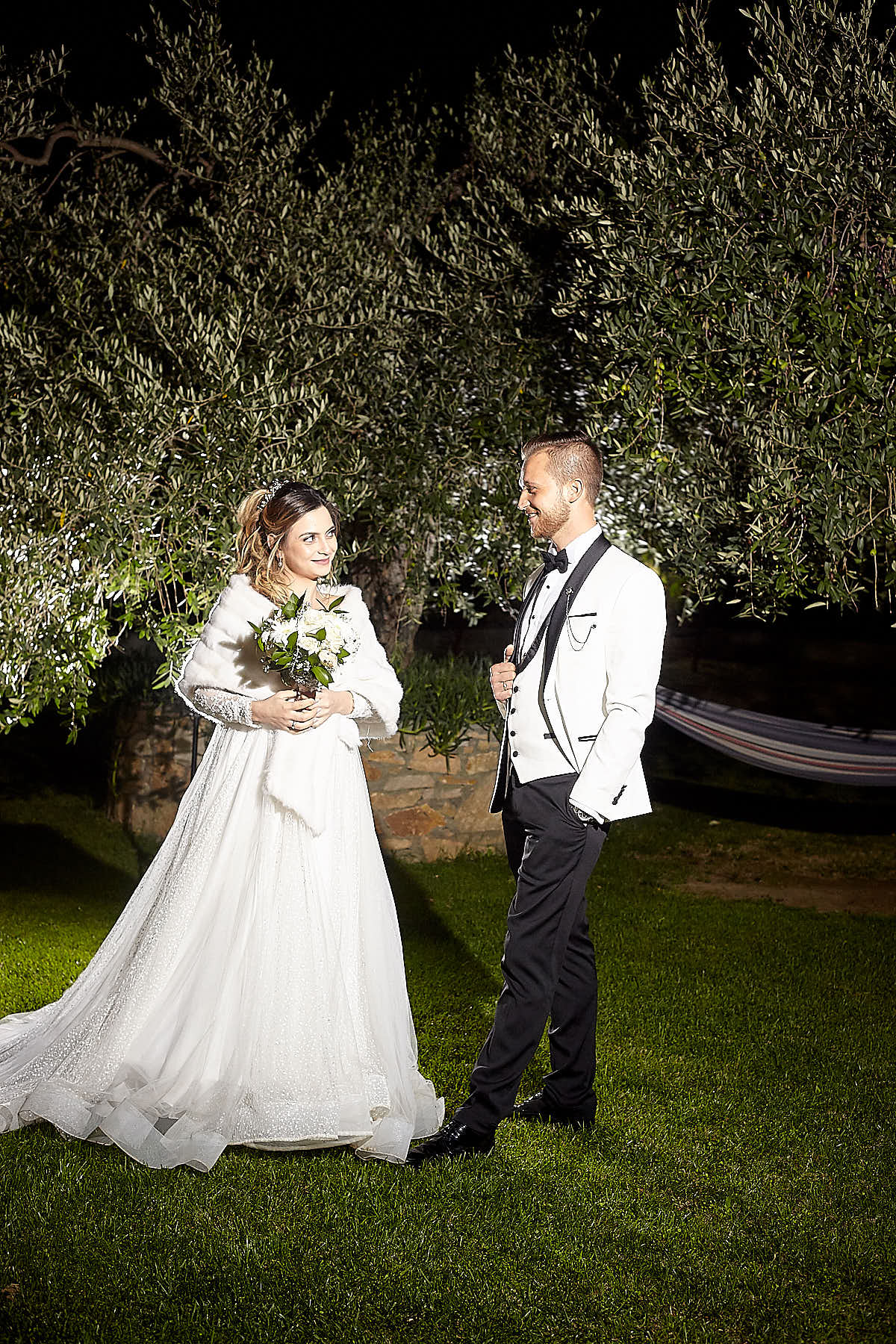 groom and bride at the garden, olive tree at the background