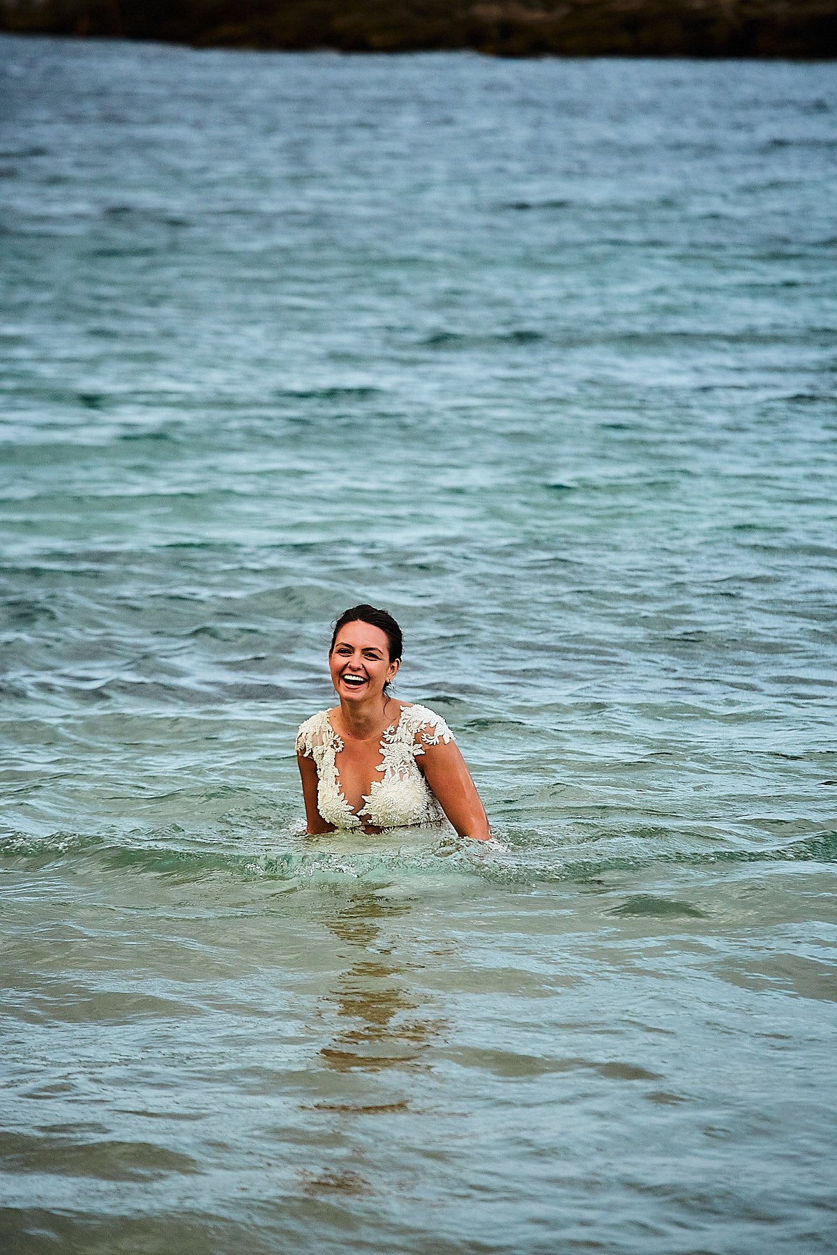 trash the dress photoshoot in water