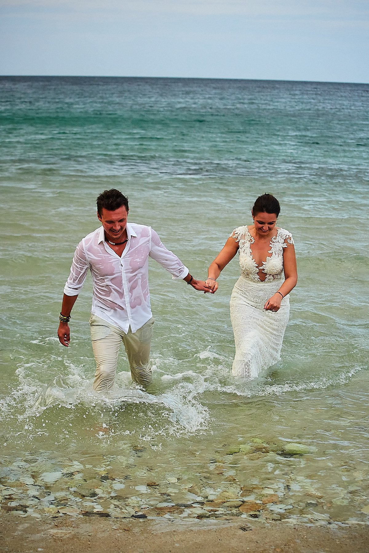 trash the dress photoshoot in water