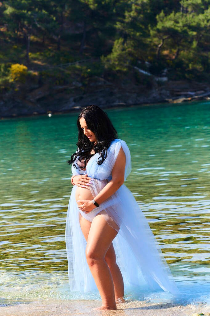 Beachside maternity photos Greece