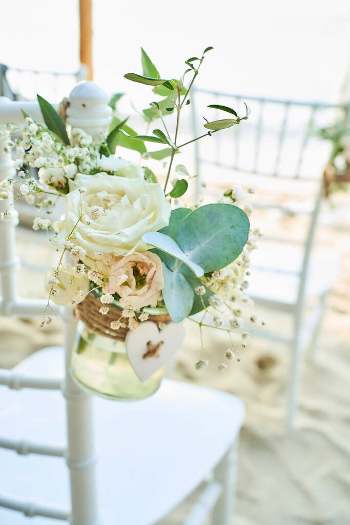 Aisle with lanterns and rose petals