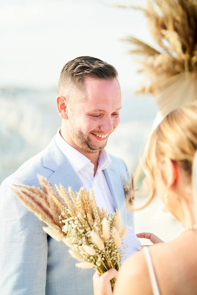 Couple exchanging vows Milos