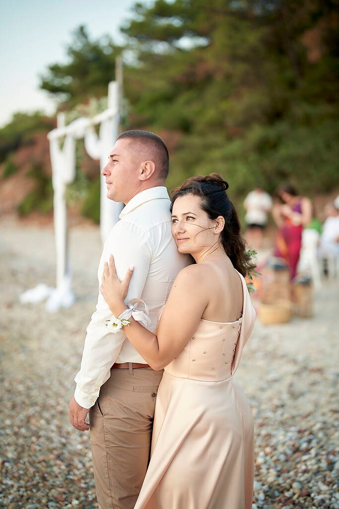 Bride smiling at horizon