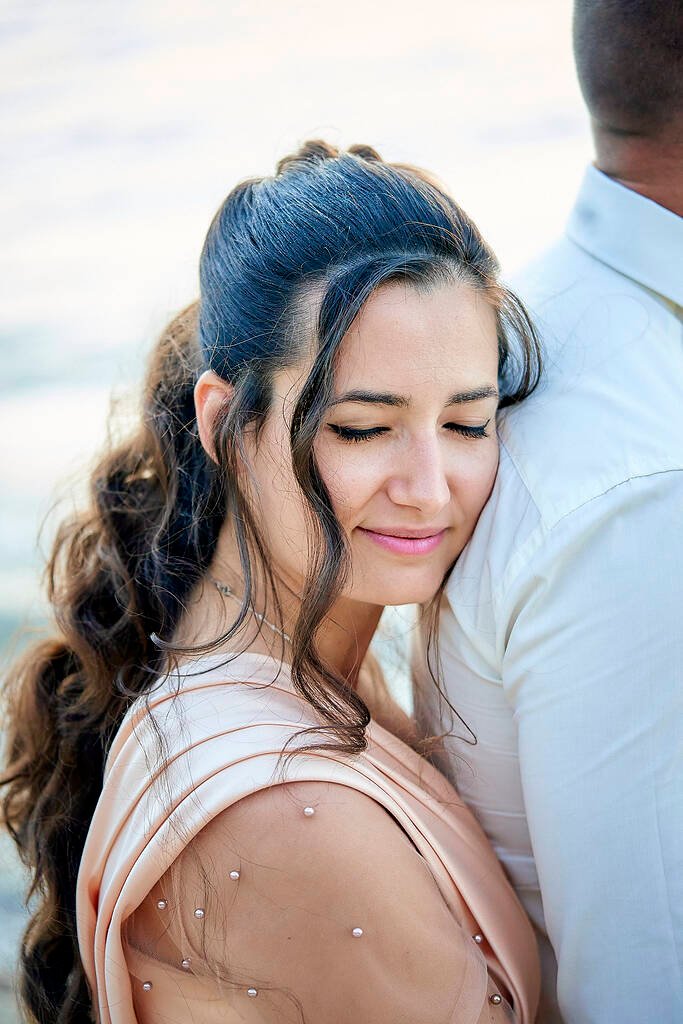 Bride adjusting hairpins Greece