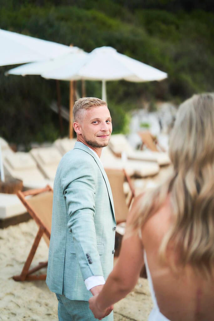 Groom waiting by the sea
