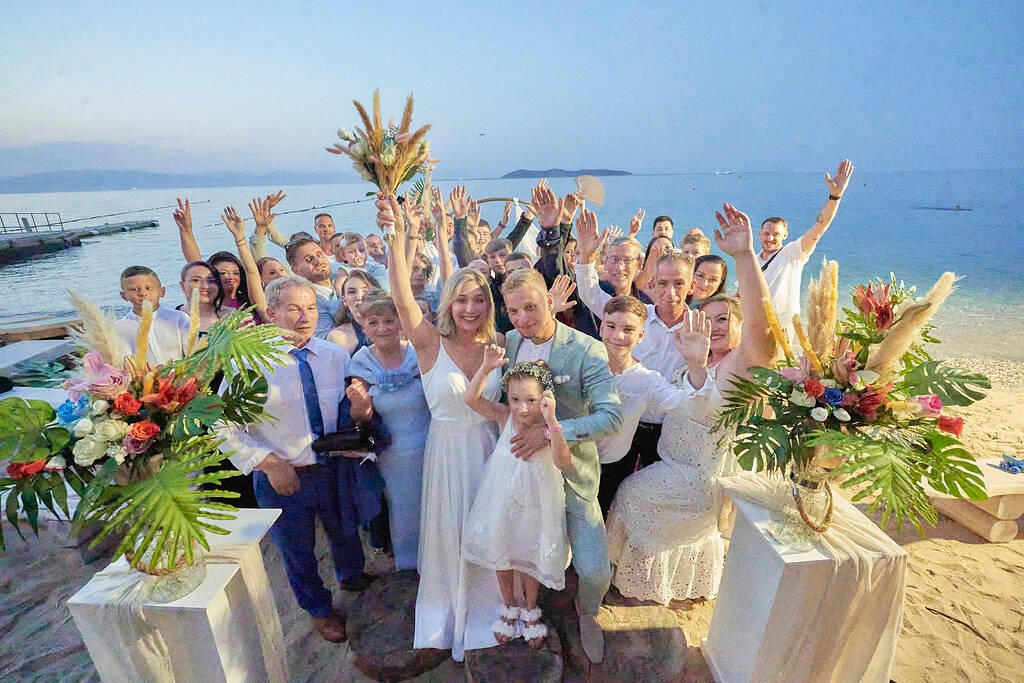 Guests hugging after ceremony