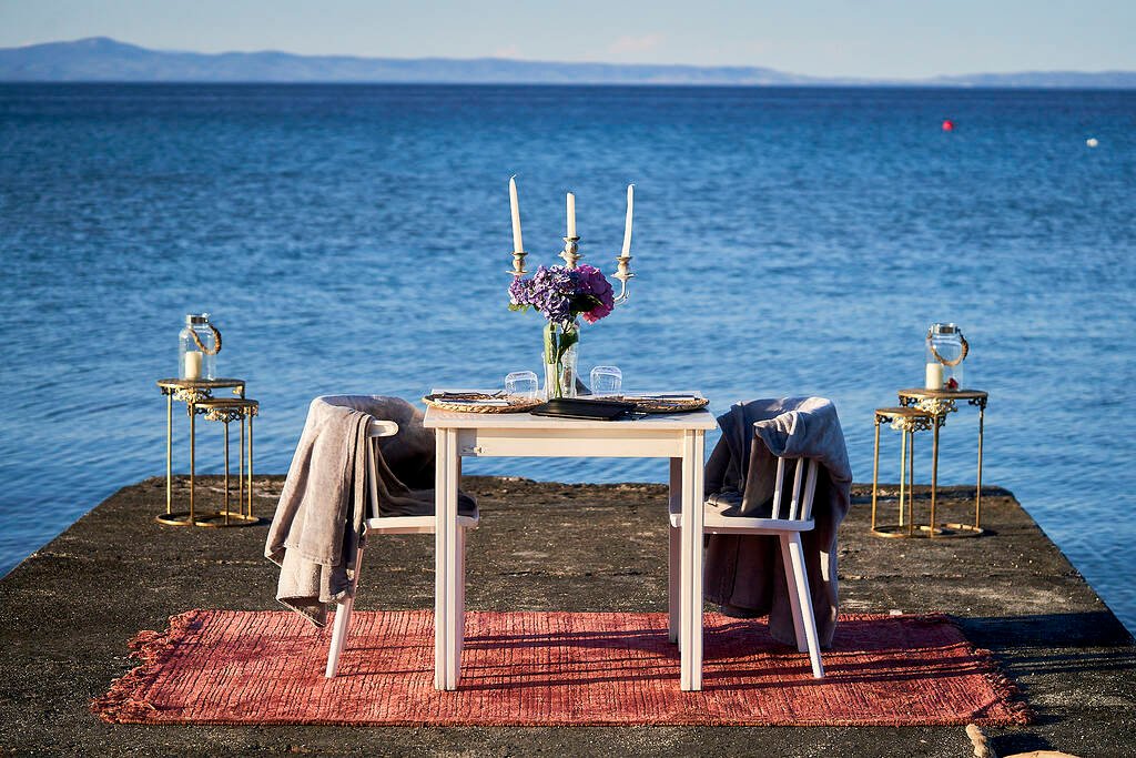 proposal setup beach dinner scene