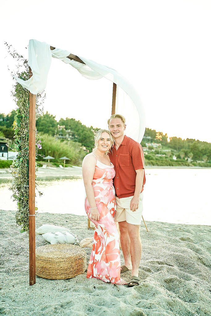 sunset glow beach engagement Greece