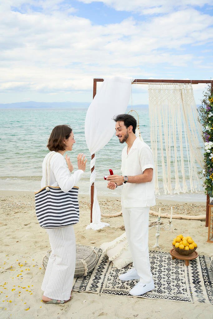 White and yellow floral proposal setup Halkidiki beach