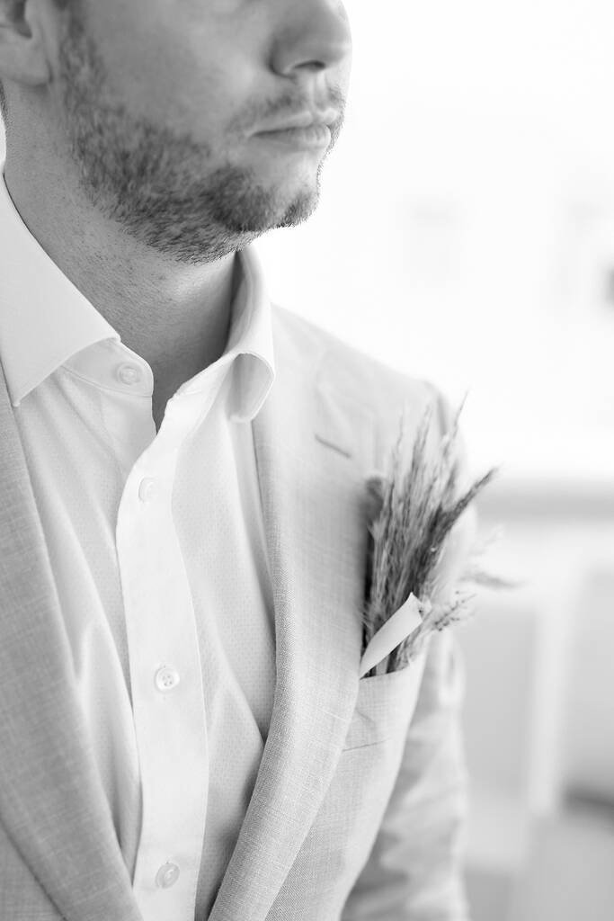 Candid beach wedding moment