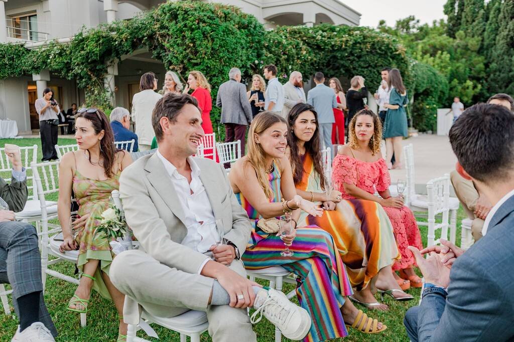 guests laughing before ceremony